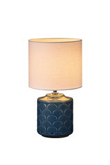 Table lamp with blue ceramic base and white fabric shade for ambient lighting