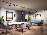 Modern living room with black track lighting, grey armchairs, and blue sofa on wooden floor