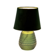 Table lamp with green glass base and black fabric shade for ambient lighting