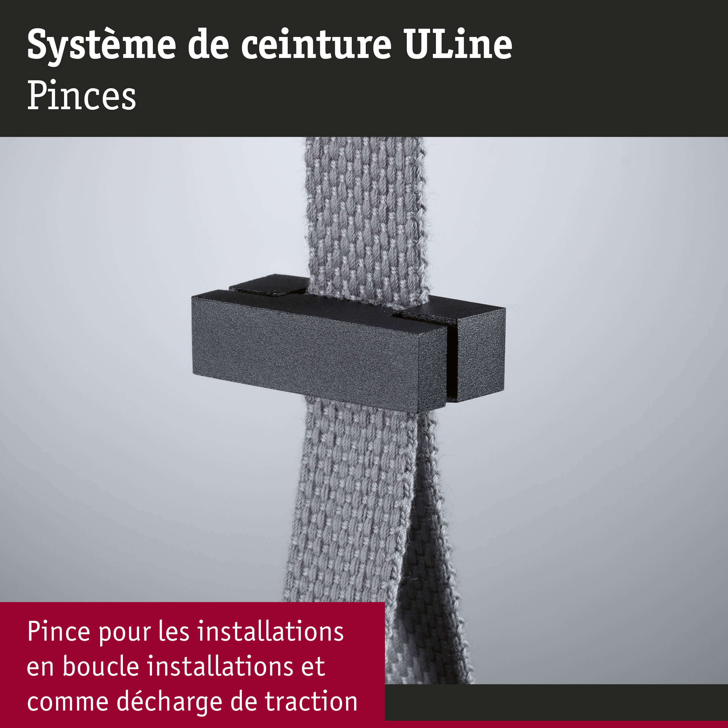 Pince métallique noire maintenant une sangle tissée grise – système de fixation pour installations