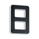 Rectangular black solar light with white edges and two rectangular cutouts for outdoor lighting