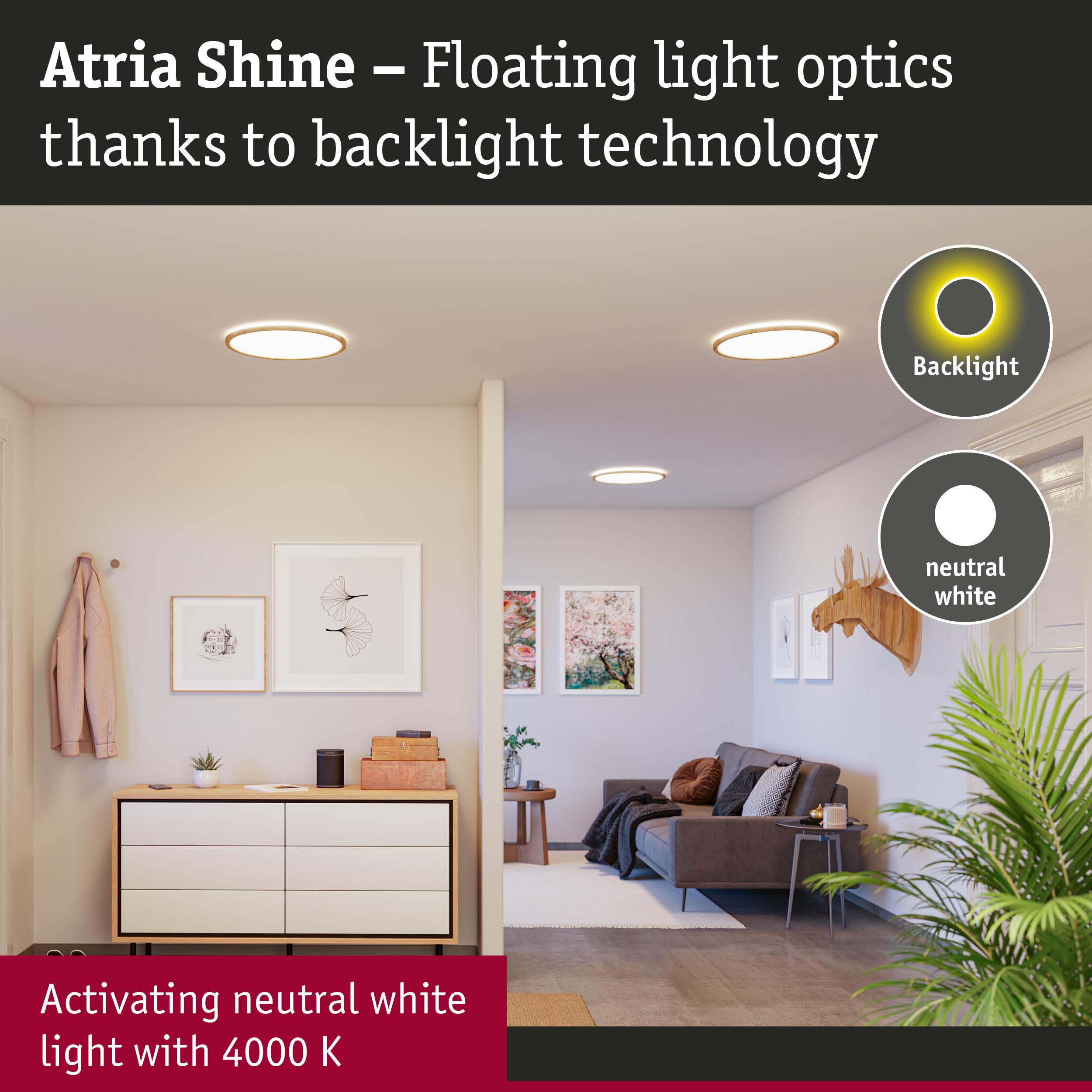 Atria Shine LED ceiling lights with neutral white light and backlight technology in a modern living room.