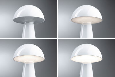 Four views of a white mushroom table lamp made of plastic with adjustable light intensity