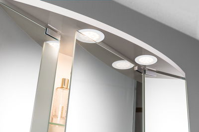 Round white LED bathroom mirror lights set with warm white light for modern bathroom lighting