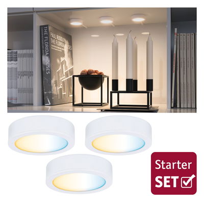 Trois plafonniers LED blancs avec lumière blanc chaud et froid en kit de démarrage pour pièces à vivre.