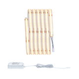 Flexible warm white LED strip with white power supply for versatile lighting applications