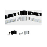 Vier zwarte en witte LED-strip connectors met pinnen voor flexibele lichtstrip montage