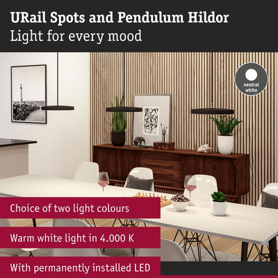 Modern black URail Hildor pendant lights with warm white LED light above dining table and sideboard