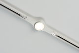 White LED track lighting with round ceiling spotlight in plastic for modern room illumination