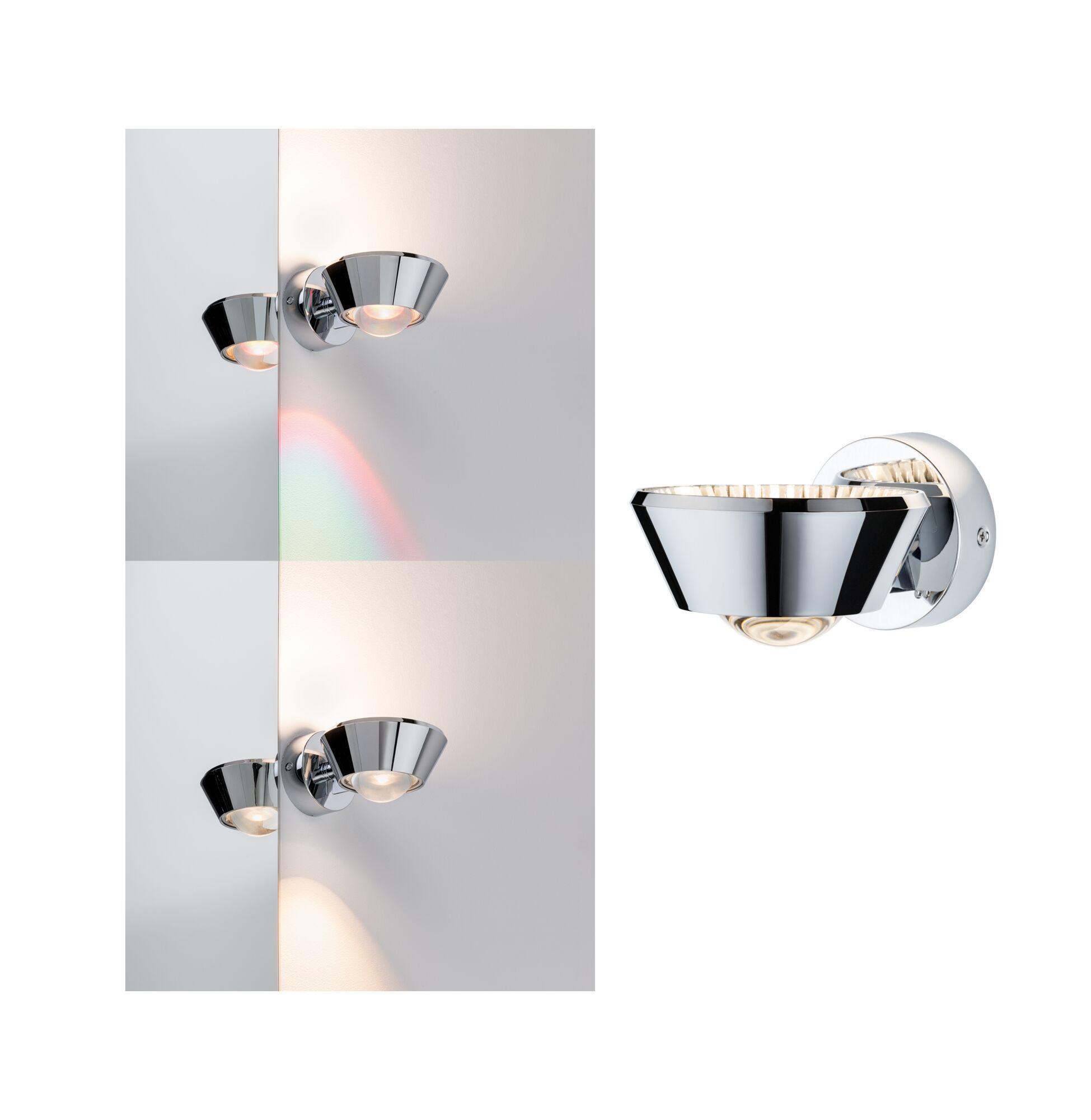 Modern chrome metal wall light with conical shape and warm white LED illumination