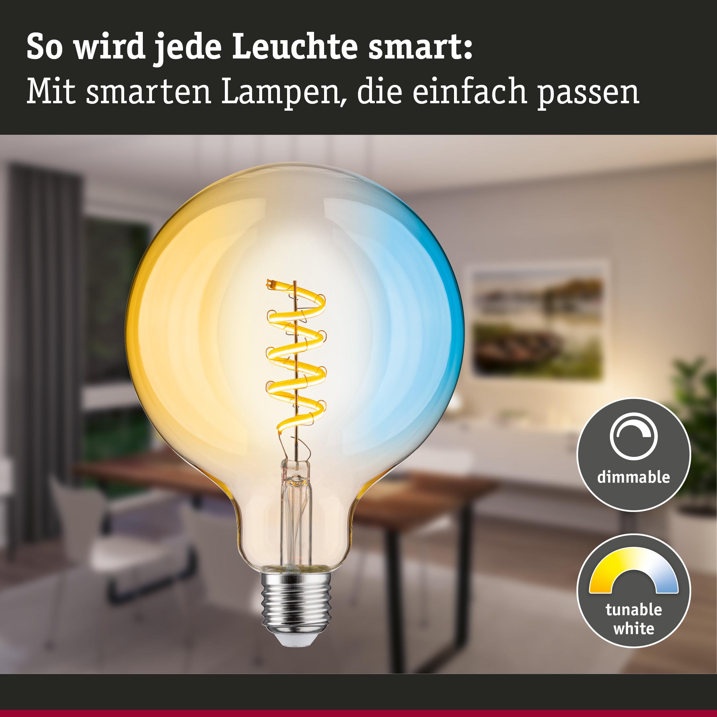 Glühbirne mit dimmbarer, einstellbarer weißer Lichtfarbe in moderner Wohnzimmereinrichtung