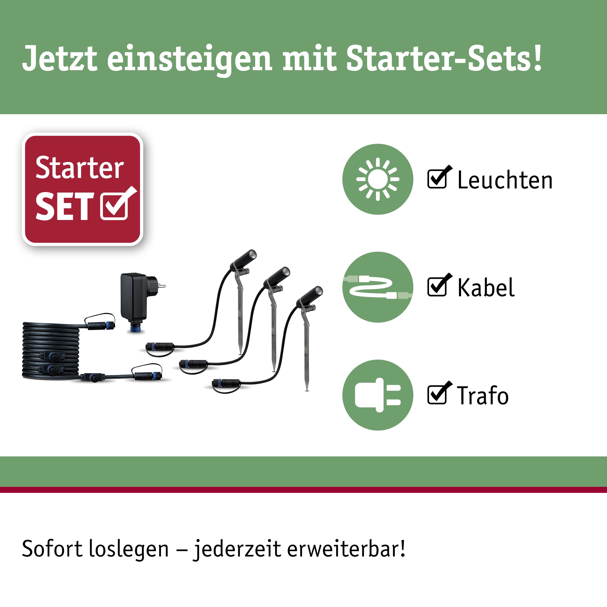 Starter-Set mit drei schwarzen LED-Gartenleuchten, Kabel und Trafo für einfache Außenbeleuchtung.