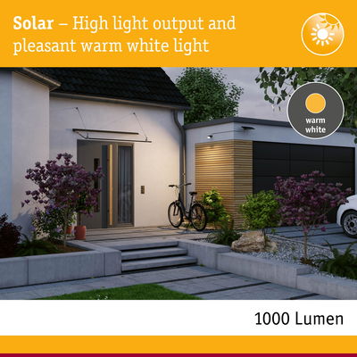 Solar outdoor light with warm white 1000 lumen output for house facade and garden lighting