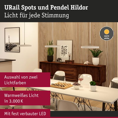 Moderne Pendelleuchten Hildor in Weiß mit warmweißem LED-Licht über Esstisch mit Schachspiel