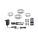 RGBW LED-Lichtband Set mit Fernbedienung, Netzteil und Verbindern für flexible Farbbeleuchtung.