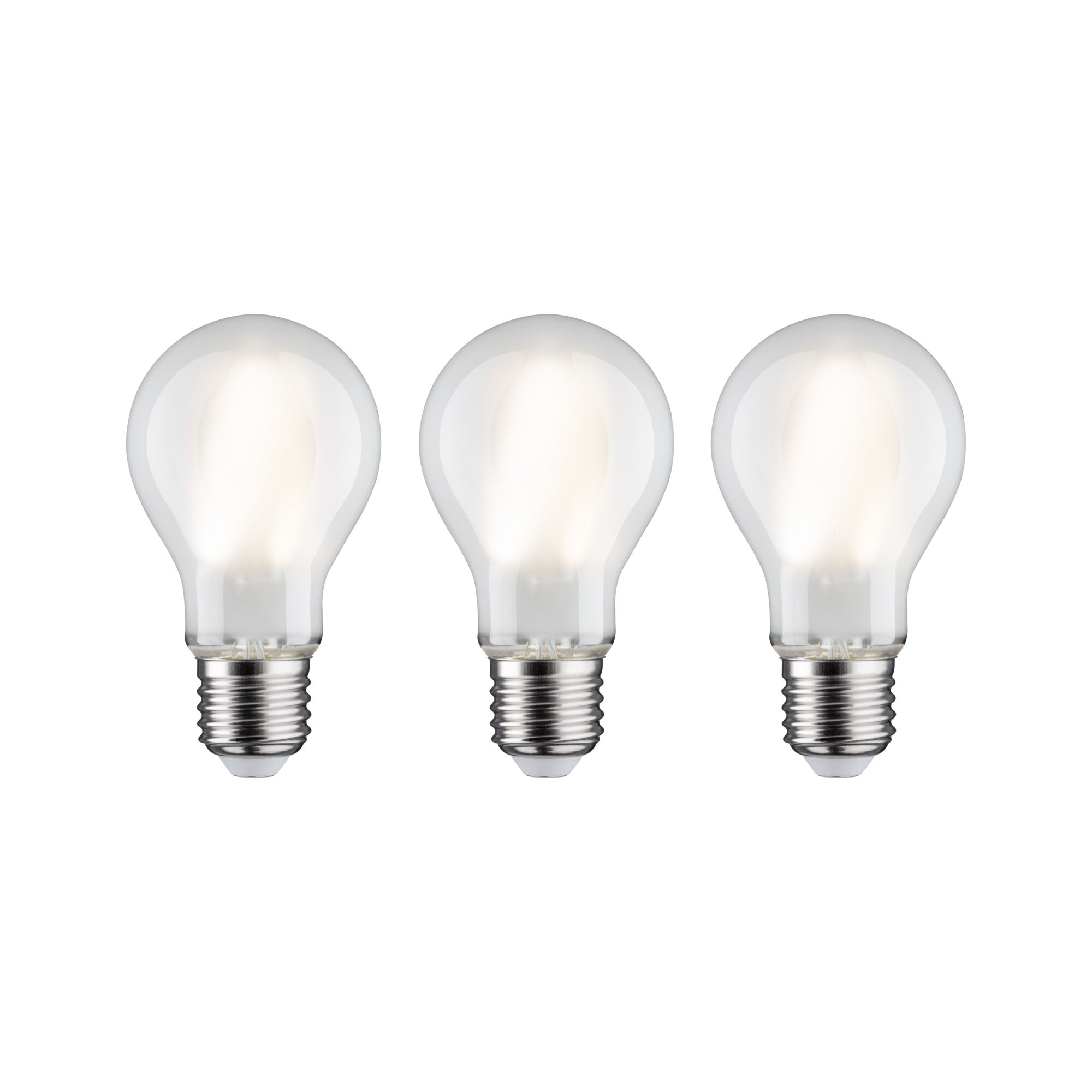 Three classic light bulbs with clear glass and metal base for energy-efficient lighting