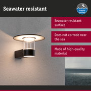 Black outdoor wall light with glass and seawater resistant surface ideal for coastal lighting