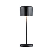 Black metal table lamp with ribbed shade and warm white LED light for modern home lighting