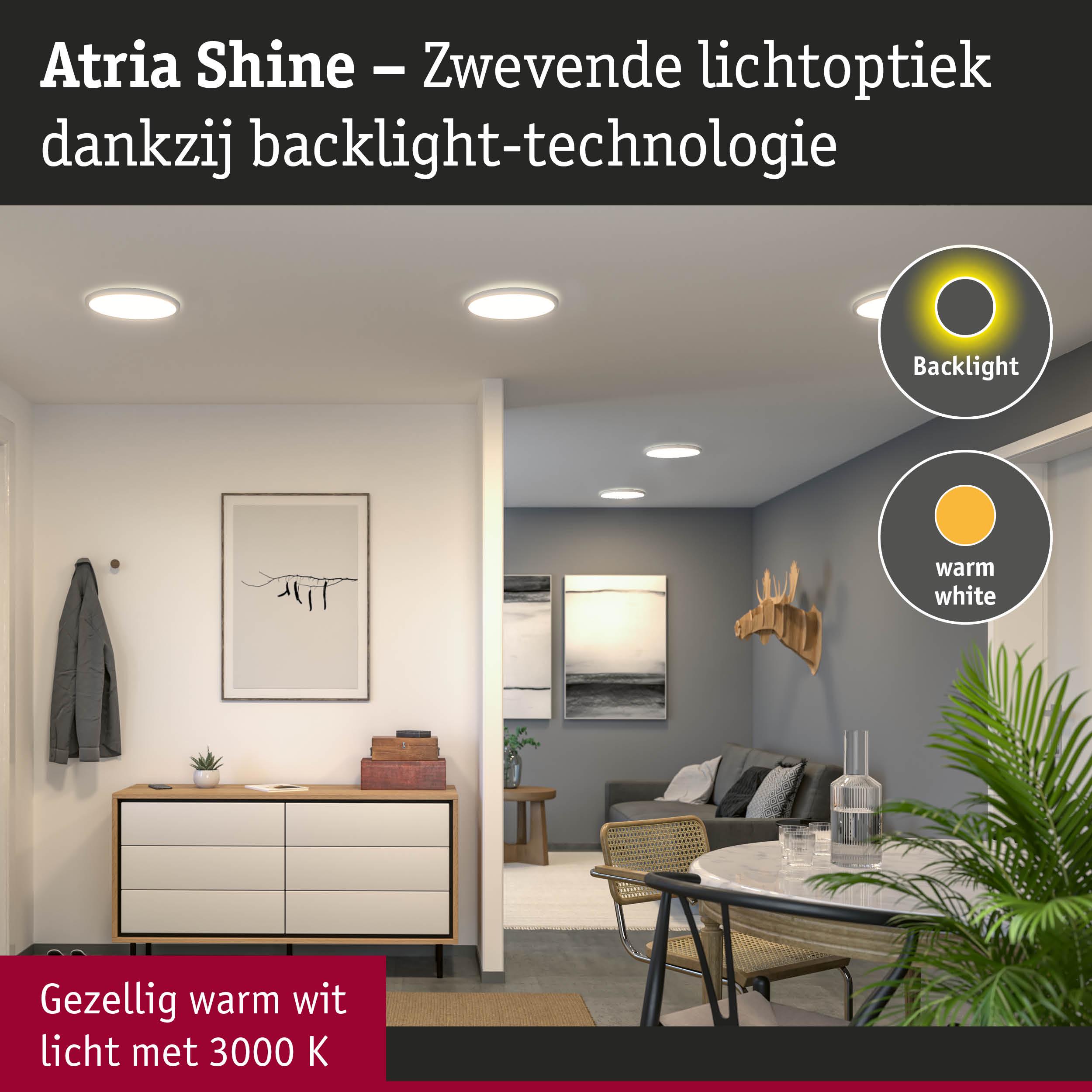 Woonkamer met Atria Shine LED-plafondlampen in warm wit licht en zwevend lichteffect