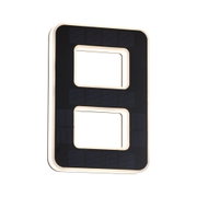 Modern black rectangular LED light panel with warm white illumination and integrated solar cells