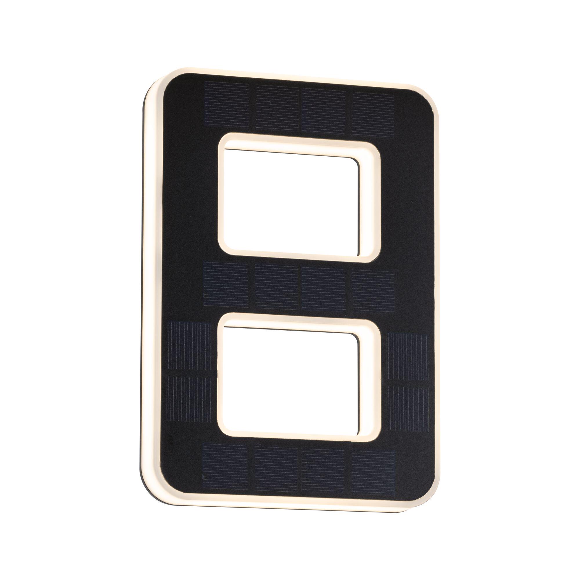 Modern black rectangular LED light panel with warm white illumination and integrated solar cells