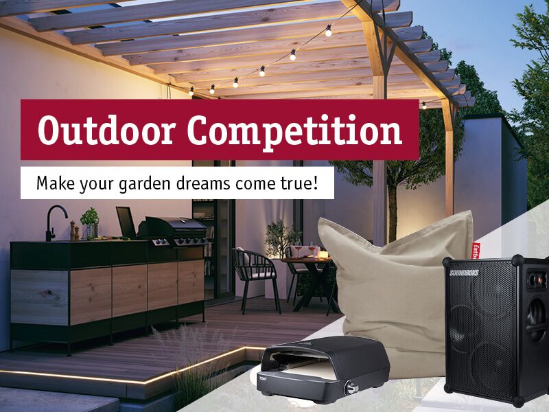 Outdoor competition featuring garden kitchen, string lights, black speaker and grey bean bag for garden ideas