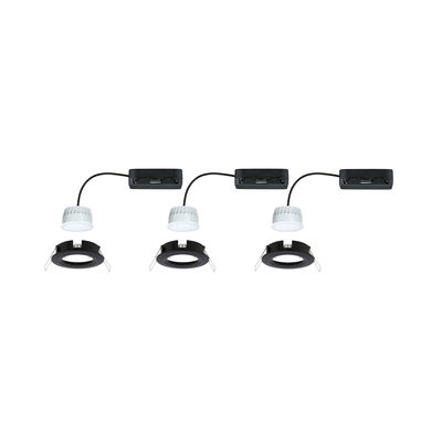 Three white LED recessed spotlights with black mounting frames and connection boxes for modern ceiling lighting