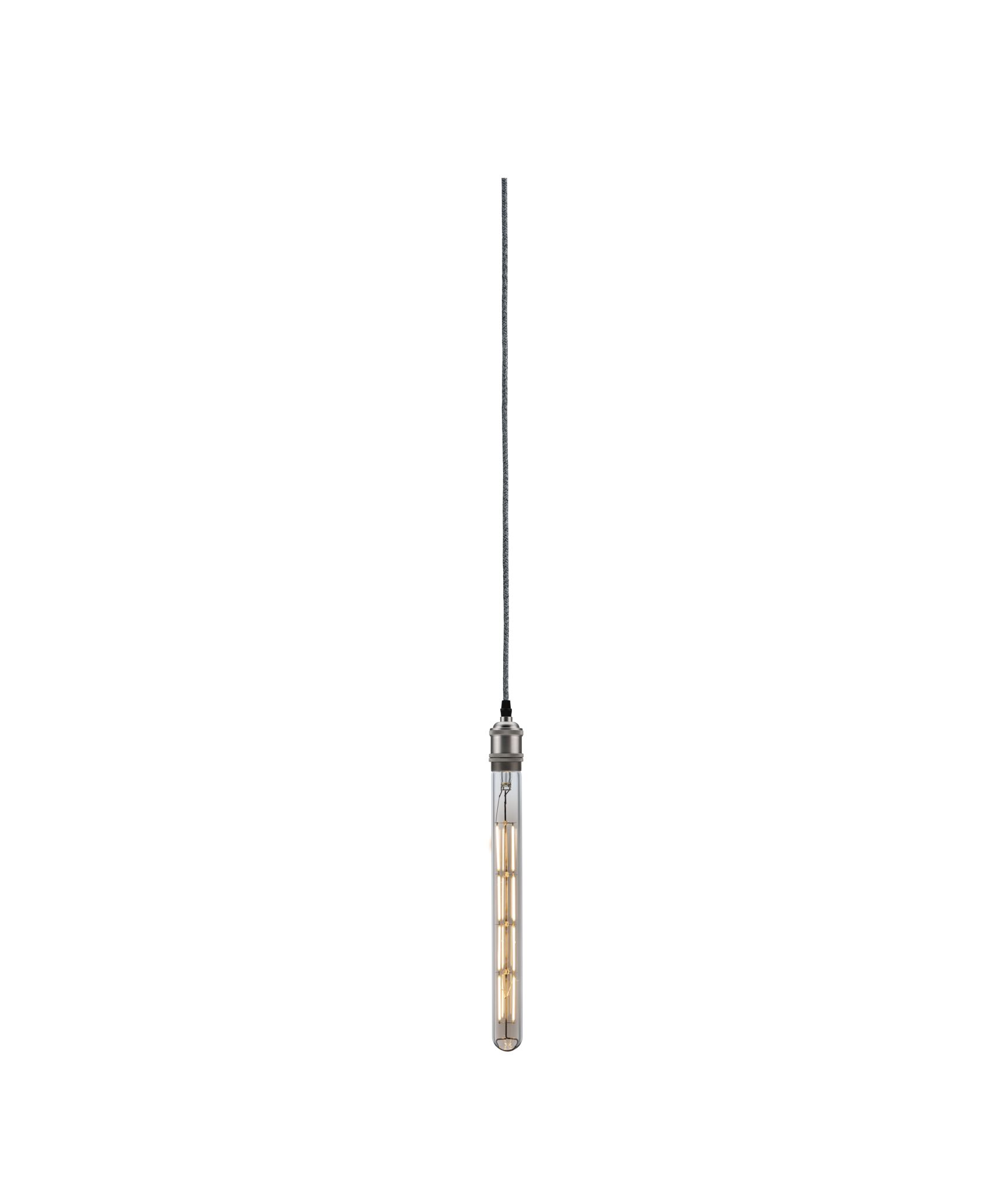 Slim pendant light with long glass cylinder and warm white LED bulb in silver finish.