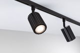 Black aluminium LED spotlight on track system for modern accent lighting in interiors