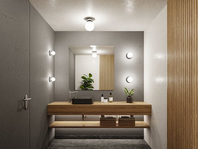 Salle de bain moderne avec meuble en bois, lavabo gris et appliques murales rondes pour un éclairage d'ambiance