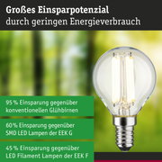 Energiesparlampe mit klarem Glas und E14 Sockel zeigt hohes Einsparpotenzial gegenüber herkömmlichen Glühbirnen