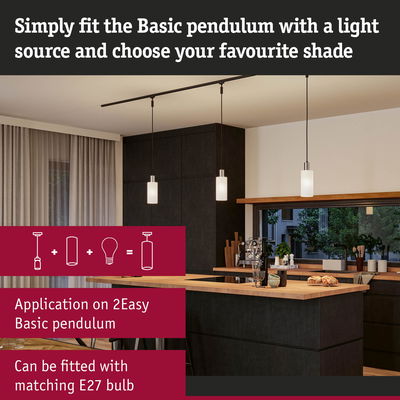 Modern kitchen with Basic Pendulum pendant lights in white glass and black cable over wooden island