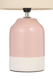 Table lamp with pink ceramic base and white speckled bottom for stylish home lighting