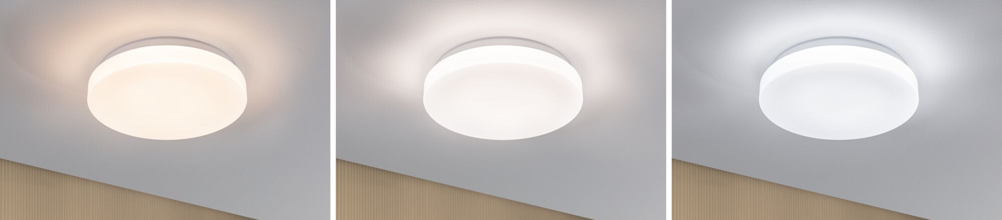Three white round LED ceiling lights showing different light colors on white ceiling.
