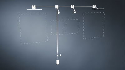 Weißes LED-Schienensystem mit vier verstellbaren Strahlern für flexible Raumbeleuchtung