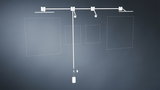 White LED track lighting system with four adjustable spotlights for versatile room illumination