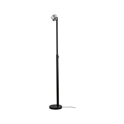 Black metal floor lamp with round base and adjustable silver spotlight for modern living spaces