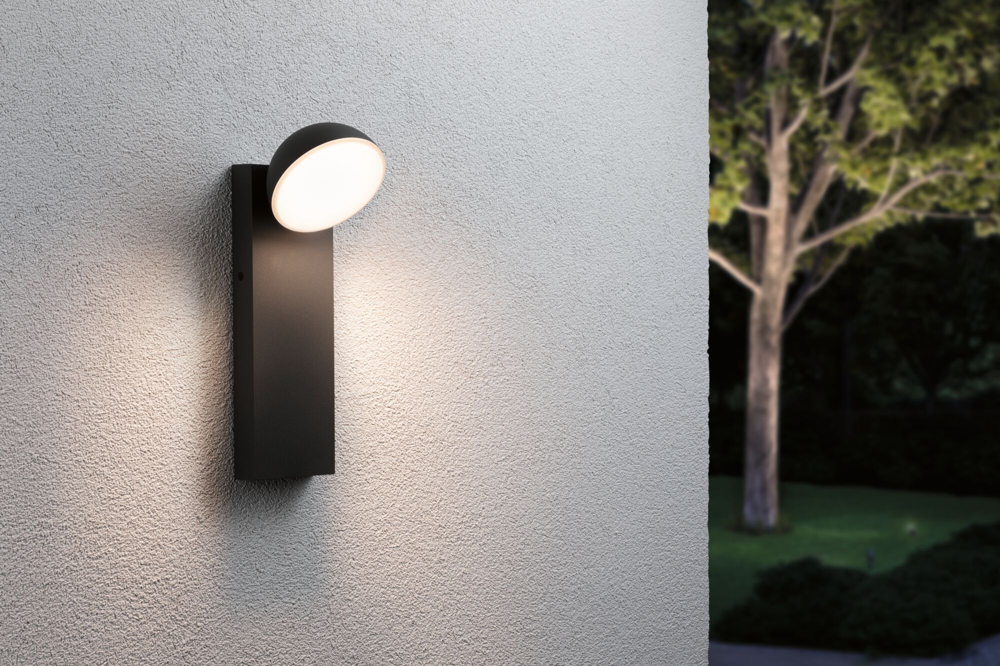 Modern black aluminum wall light with round opal diffuser and warm white LED for outdoor lighting.