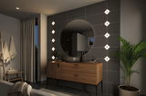 Modern bathroom with wooden vanity, round mirror, and warm white LED wall lights for ambient lighting.