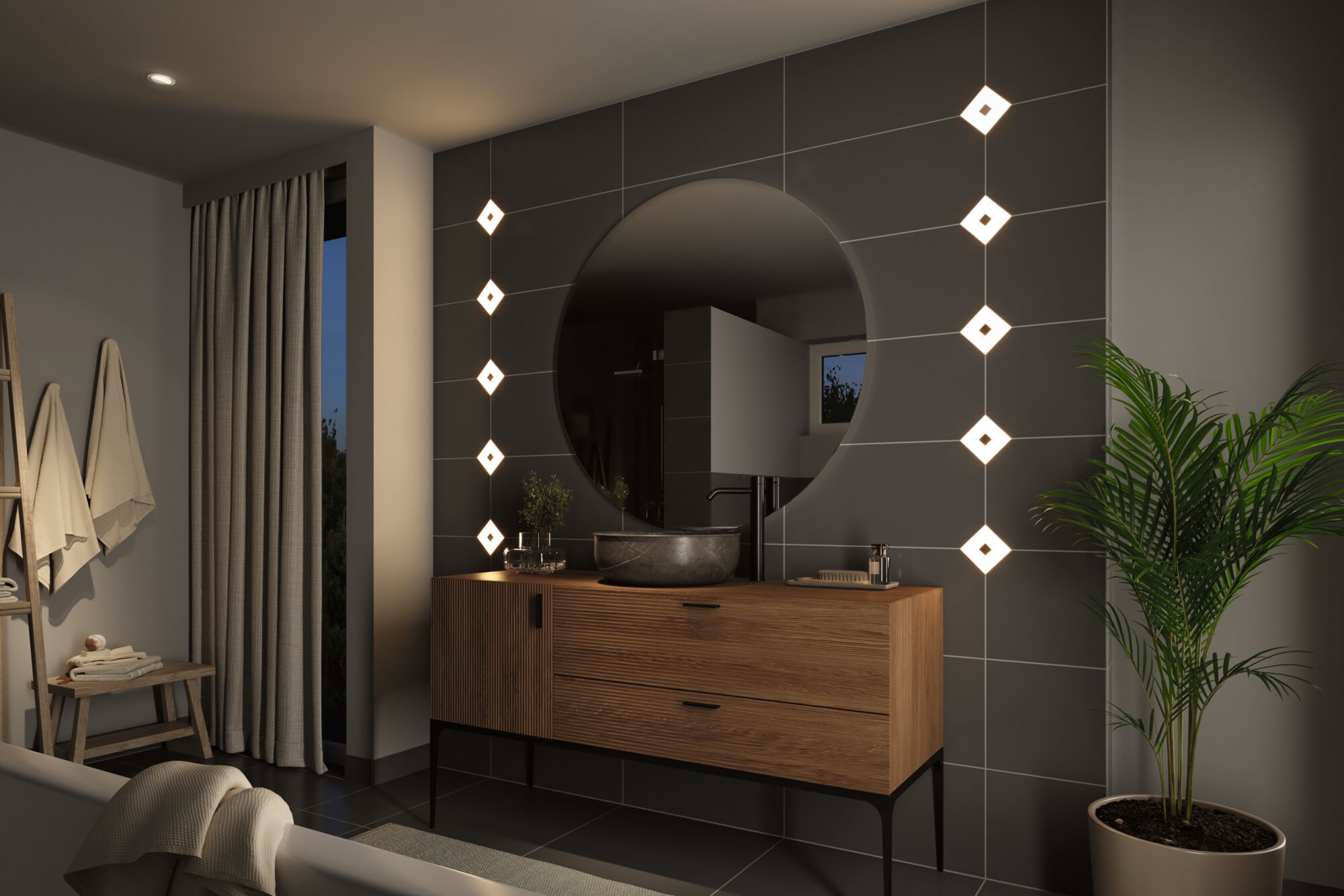 Modernes Badezimmer mit Holz-Waschtisch, rundem Spiegel und LED-Wandleuchten in warmweißem Licht.