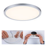 Round LED ceiling light with silver aluminum frame and warm white light, installation steps with spring clips.