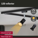 Black LED reflector with dimmable warm white light and 36° beam angle mounted on ceiling track