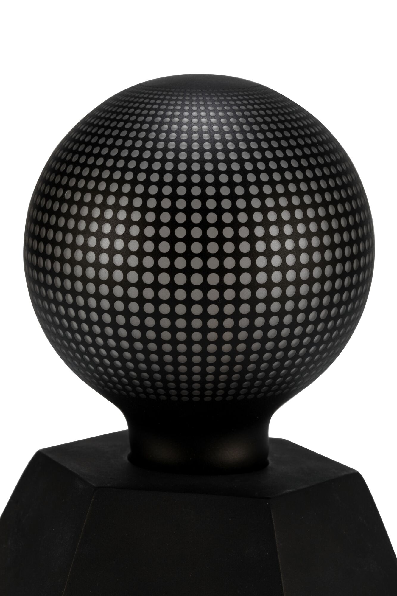 Black metal sphere with dotted pattern on hexagonal base, modern LED decorative light