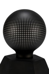 Black metal sphere with dotted pattern on hexagonal base, modern LED decorative light