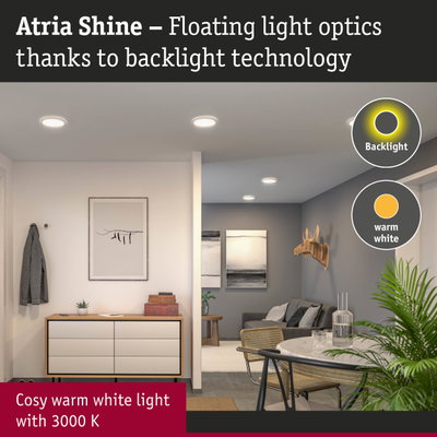 Living room with Atria Shine LED ceiling lights emitting warm white light and modern decor
