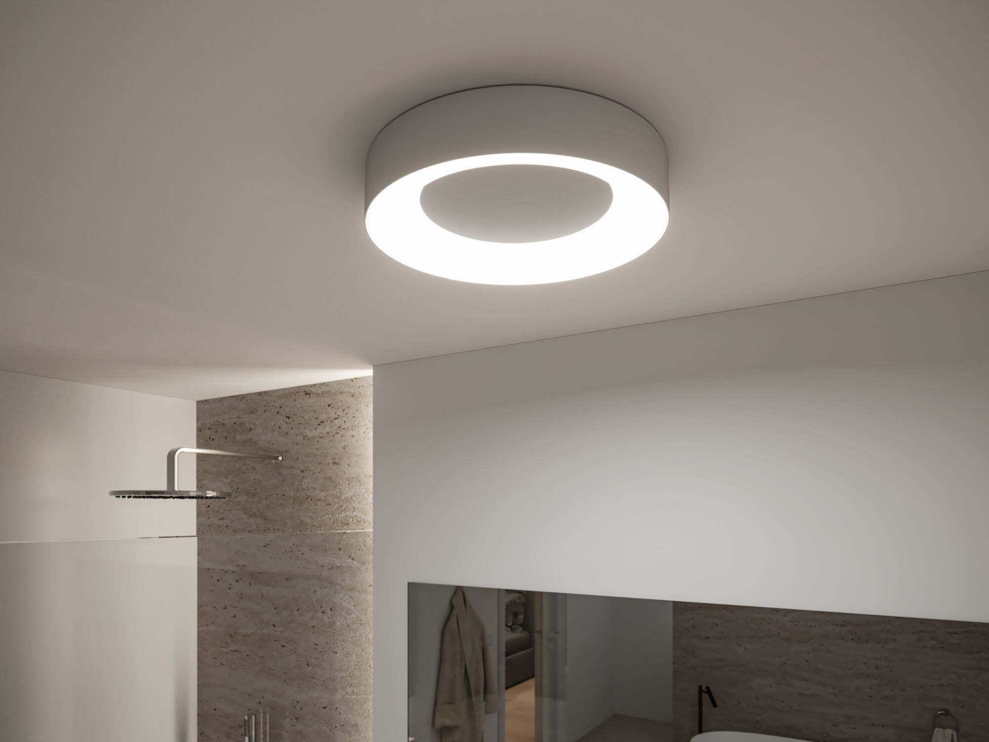 Runde weiße LED-Deckenleuchte mit modernem Design in Badezimmer mit Natursteinwand