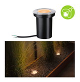 Black metal recessed outdoor light with warm white glow for garden and pathway lighting