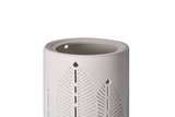 White ceramic oil burner with delicate leaf patterns for atmospheric home fragrance and lighting