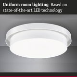 Round white LED ceiling light made of plastic for uniform room lighting with modern technology