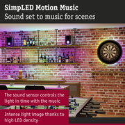 Bar with red brick walls, LED lighting, dartboard in music and game room setting